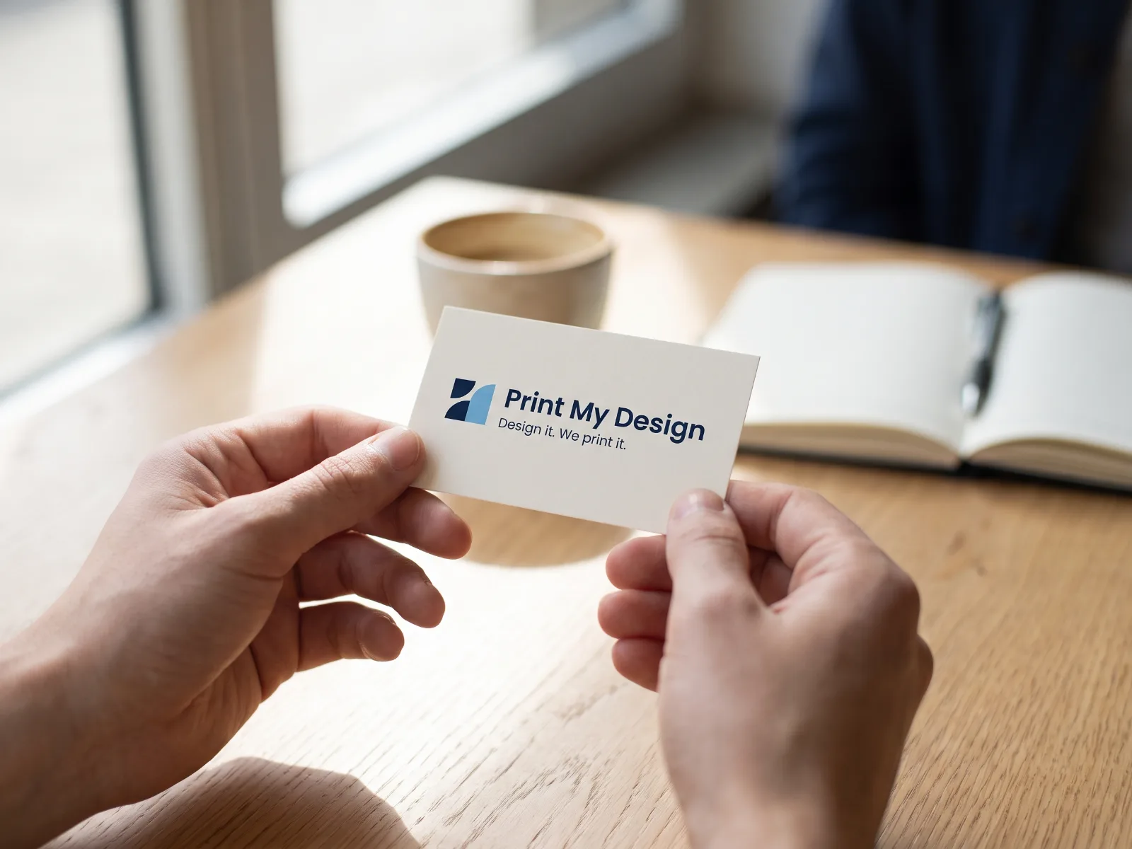 Business Cards held in hand